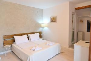 Postel nebo postele na pokoji v ubytování Guest House 7
