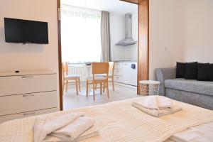 Postel nebo postele na pokoji v ubytování Guest House 7