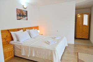 Postel nebo postele na pokoji v ubytování Guest House 7