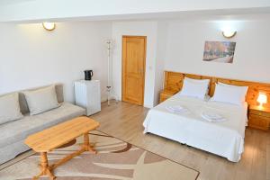 Postel nebo postele na pokoji v ubytování Guest House 7