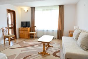 TV a/nebo společenská místnost v ubytování Guest House 7