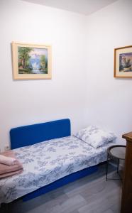 Postel nebo postele na pokoji v ubytování Trebinje Ana apartman + 5 fotografií