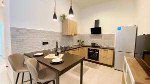 Kuchyň nebo kuchyňský kout v ubytování Urban Suites - B&B