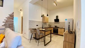 Kuchyň nebo kuchyňský kout v ubytování Urban Suites - B&B