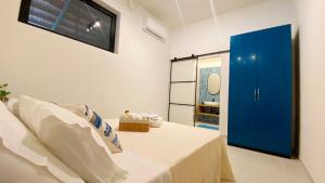 Postel nebo postele na pokoji v ubytování Urban Suites - B&B + 8 fotografií