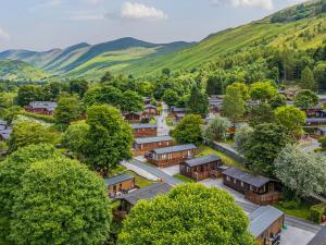 an aerial view of a small village in the mountains at Fell Foot Lodge in Windermere