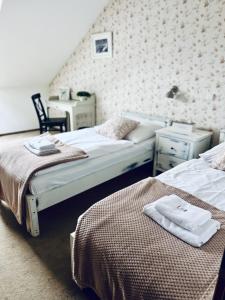 Postel nebo postele na pokoji v ubytování Hotel Pošta