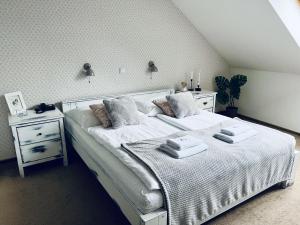Postel nebo postele na pokoji v ubytování Hotel Pošta