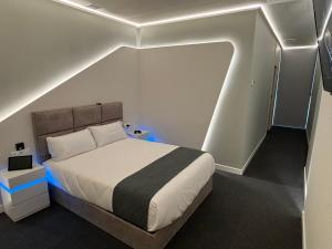 Postel nebo postele na pokoji v ubytování Futurotel Sevilla