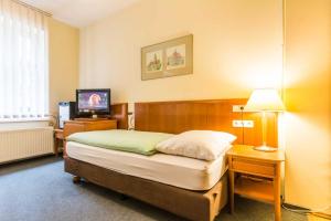 Ένα ή περισσότερα κρεβάτια σε δωμάτιο στο Hostel Nina
