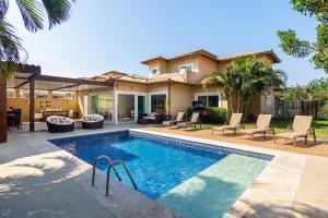 Bazén v ubytování Bz71 Centro! Linda casa c/ Piscina privativa! nebo v jeho okolí
