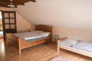 Letto o letti in una camera di Apartmán u Zámku Jindřichův Hradec