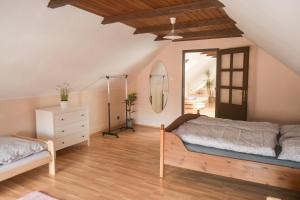 Letto o letti in una camera di Apartmán u Zámku Jindřichův Hradec