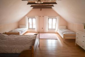 Letto o letti in una camera di Apartmán u Zámku Jindřichův Hradec