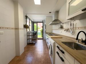 a kitchen with a sink and a counter at La Ensenada de Meruelo - 2805 in San Miguel de Meruelo