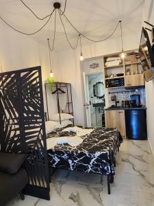 Η κουζίνα ή μικρή κουζίνα στο Luxury Suites Artisti Elena 1