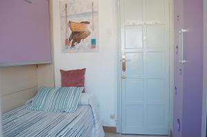 A bed or beds in a room at Apartamento San Juan de Dios