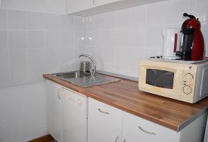 A kitchen or kitchenette at Apartamento San Juan de Dios