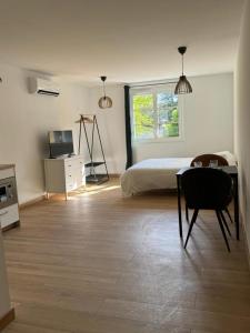 Postel nebo postele na pokoji v ubytování Comme à la Maison