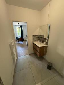Koupelna v ubytování Comme à la Maison + 2 fotografie