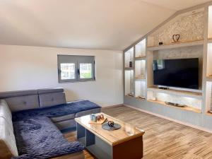 a living room with a couch and a table at Apartment Victor in Kotor