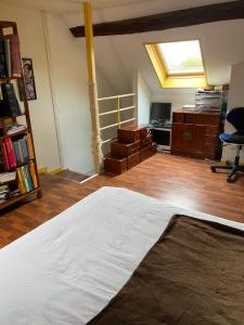 Posezení v ubytování Chambre spacieuse