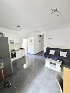 Kuchyňa alebo kuchynka v ubytovaní Apartment Gitara