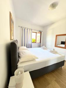 Posteľ alebo postele v izbe v ubytovaní Apartment Gitara