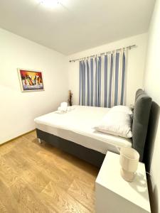 Posteľ alebo postele v izbe v ubytovaní Apartment Gitara