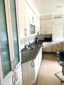 Η κουζίνα ή μικρή κουζίνα στο Apartamento Vieiteiras