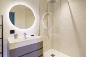 a bathroom with a sink and a shower at Bordazaharria in Espelette +23 photos