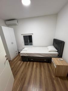 Voodi või voodid majutusasutuse Big House toas