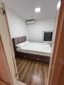 Voodi või voodid majutusasutuse Big House toas