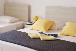 Postel nebo postele na pokoji v ubytování Guesthouse Miranda NP Krka