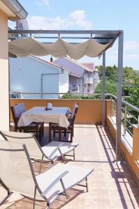 Balkón nebo terasa v ubytování Guesthouse Miranda NP Krka