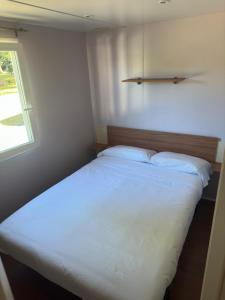 Postel nebo postele na pokoji v ubytování Camping LagoMar