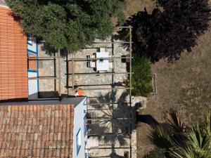 an overhead view of a street light next to a house at Fonte Santa beautiful villa in Santiago do Cacém
