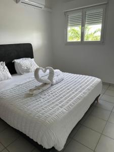 Voodi või voodid majutusasutuse Appartement T2 Chic - vue mer et montagne toas