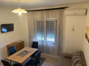 Et tv og/eller underholdning på Guest House Ana