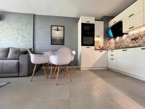 Køkken eller tekøkken på Park Side Apartment Green Life Resort