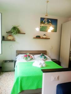 Postel nebo postele na pokoji v ubytování Casa Luigi