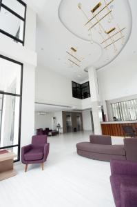 Χώρος καθιστικού στο Genio Hotel Manado