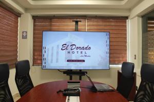 a large screen tv in a conference room at El Dorado in Los Mochis