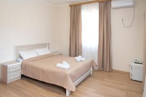 Postel nebo postele na pokoji v ubytování Hotel Veranda