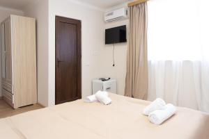 Postel nebo postele na pokoji v ubytování Hotel Veranda