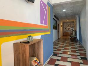 TV a/nebo společenská místnost v ubytování Hostal El Naufrago 2