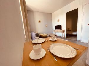 TV a/nebo společenská místnost v ubytování Albuconis 2 Appartement 1 chambre