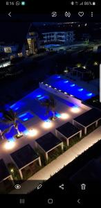 an overhead view of a building with blue lights at Apartamento Vista al Mar Morros Eco in Cartagena de Indias +10 photos
