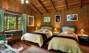 Ένα ή περισσότερα κρεβάτια σε δωμάτιο στο Sachatamia Lodge +119 φωτογραφίες