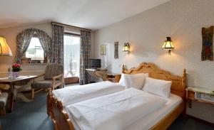 Posteľ alebo postele v izbe v ubytovaní Alpenappartement Europa